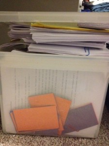 An overflowing box of my YA novel drafts and revisions