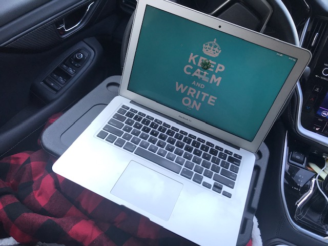 Steering wheel desk surface for writing in a parked car